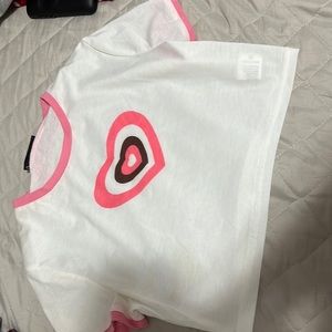 white crop tee with a pino heart